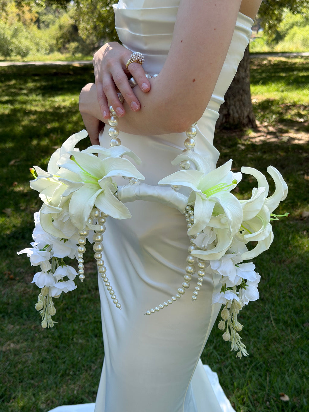 BRIDAL BOUQUET LILIES AND DELPHINIUMS