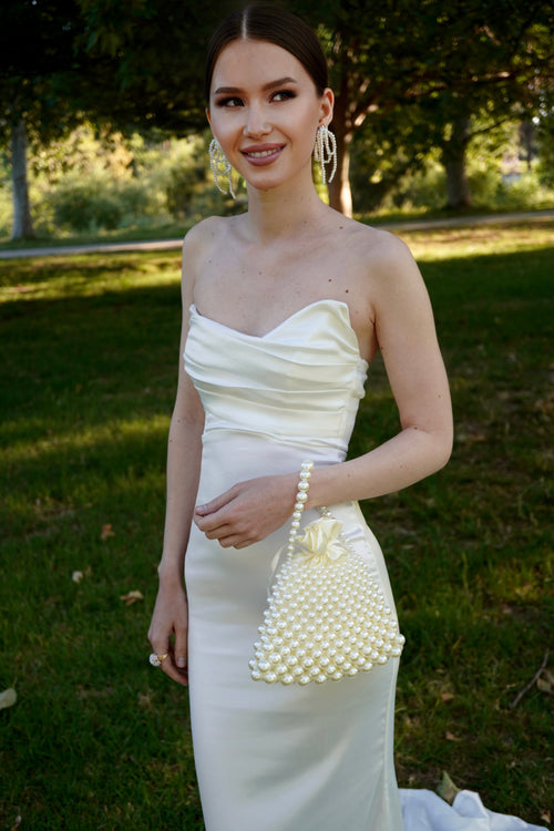 TRAPEZOID-SHAPED BAG